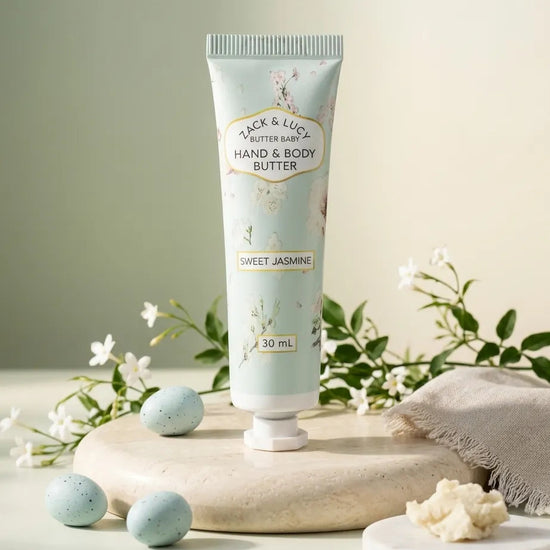 Tube of Jack & Lily Sweet Jasmine hand and body butter on a neutral background with flowers and a towel.